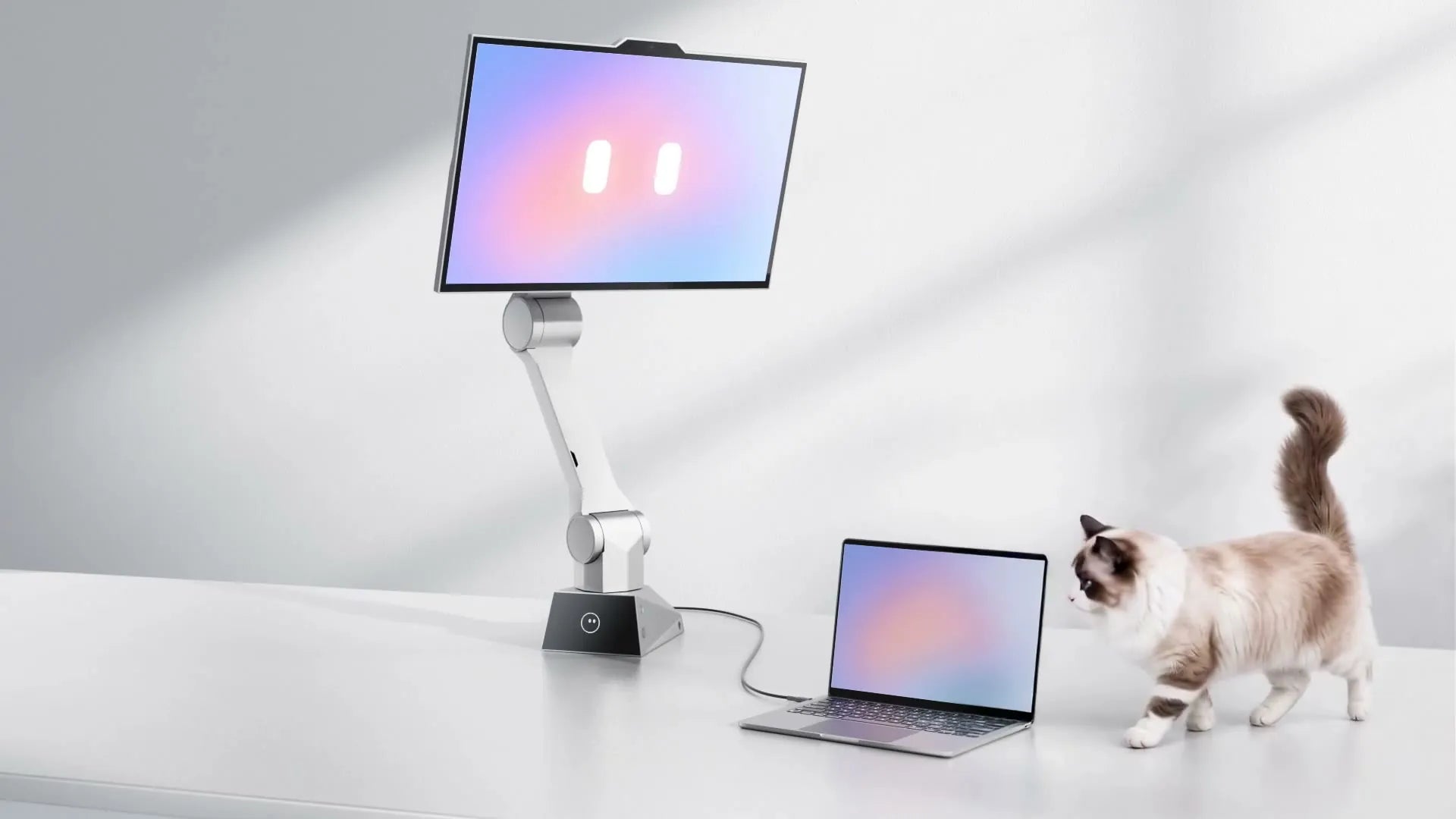 CyboPal ONE robotic 27-inch monitor mounted above a desktop workspace